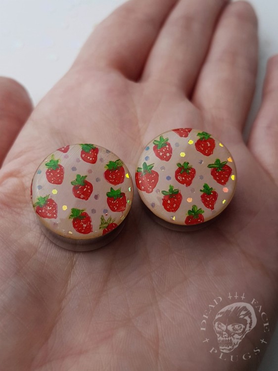 Artistic ear plugs with hand-painted fruits and rainbow sparkle