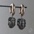 Silver piece of ammonite and gold chunky shiny hoops  ear weights artifact hangers