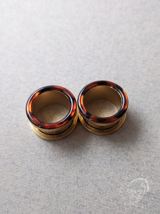 Handmade surgical steel ear plugs with brown and orange tortoiseshell resin