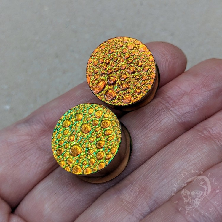 orange gold and green textured reptilian snake skin plugs gauges for stretched ears trendy alternative