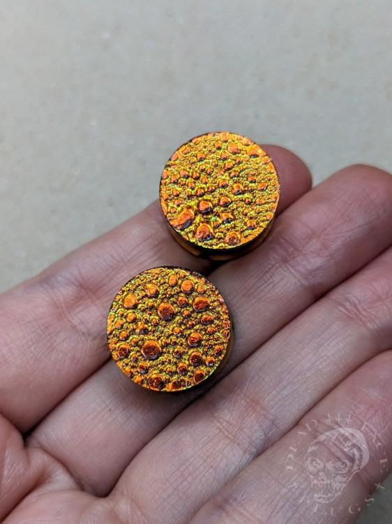 orange gold and green textured reptilian snake skin plugs gauges for stretched ears trendy alternative