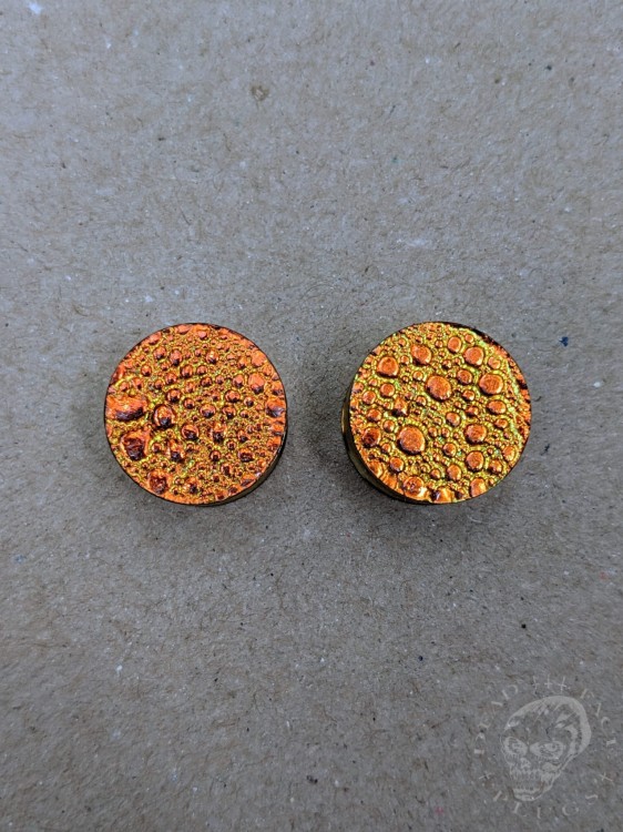 orange gold and green textured reptilian snake skin plugs gauges for stretched ears trendy alternative