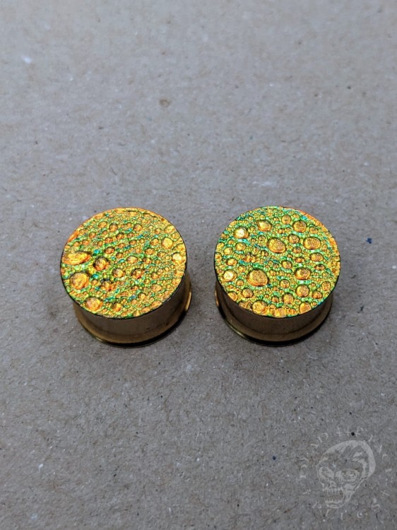 orange gold and green textured reptilian snake skin plugs gauges for stretched ears