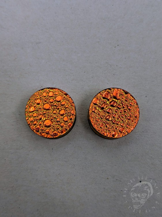 orange gold and green textured reptilian snake skin plugs gauges for stretched ears
