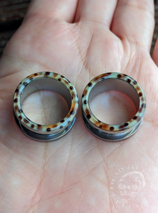 Rainbow trout skin pattern ear tunnels in mint, lemon, orange, and pink colors made of surgical steel and resin – unique colorful body jewelry