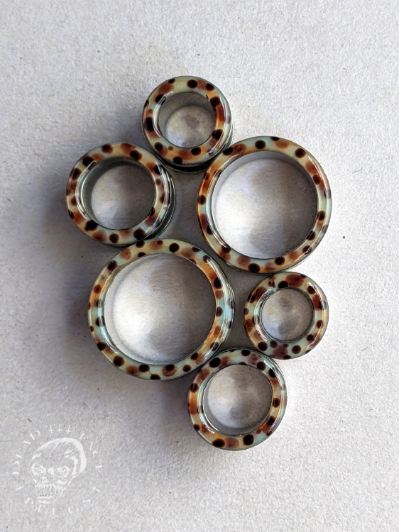 Rainbow trout skin pattern ear tunnels in mint, lemon, orange, and pink colors made of surgical steel and resin – unique colorful body jewelry