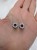 Elegant silver ear tunnels decorated with tiny white pearls