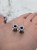Elegant silver ear tunnels decorated with tiny white pearls