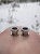 Stainless steel ear tunnels with tiny pearls and soft shimmer