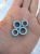 Ear tunnels with opalescent flakes in blue turquoise and green tones
