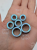 Ear tunnels with opalescent flakes in blue turquoise and green tones