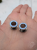 Ear tunnels with opalescent flakes in blue turquoise and green tones