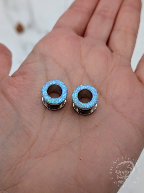 Ear tunnels with opalescent flakes in blue turquoise and green tones